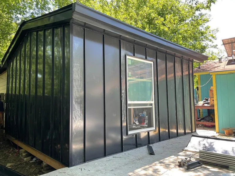 Black standing seam metal wall panels for Metal Roof Installation in Flowing Wells